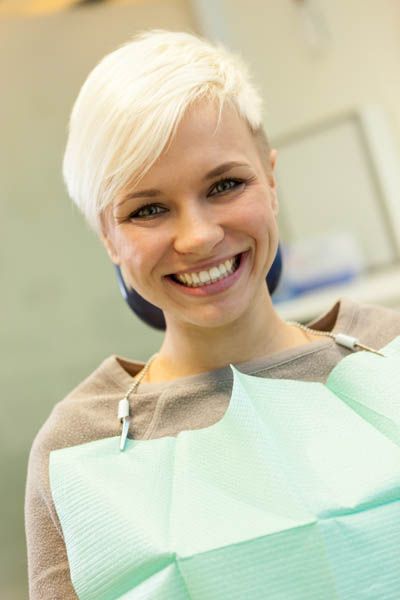 woman getting dental services at Beavercreek Dental thanks to their discount plan