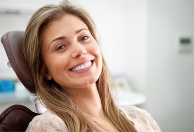woman smiling after getting a laser dentistry procedure done at Beavercreek Dental