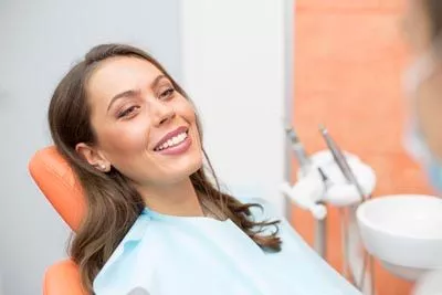 woman smiling during her first visit at Beavercreek Dental