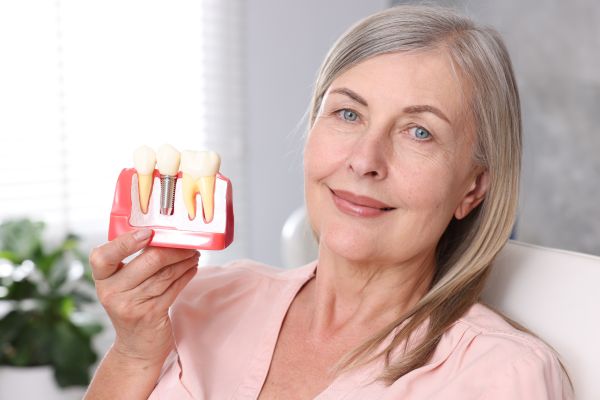 Benefits Of Dental Implants Compared With Traditional Dentures